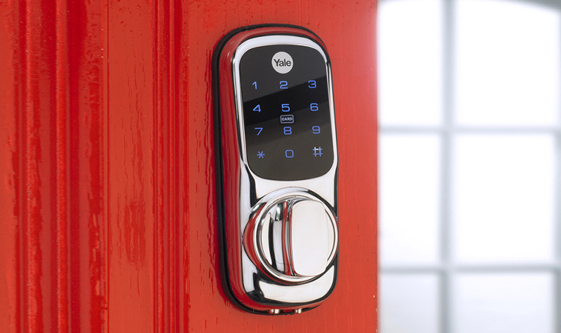 Yale Keyless Smart Lock On Red Wooden Door