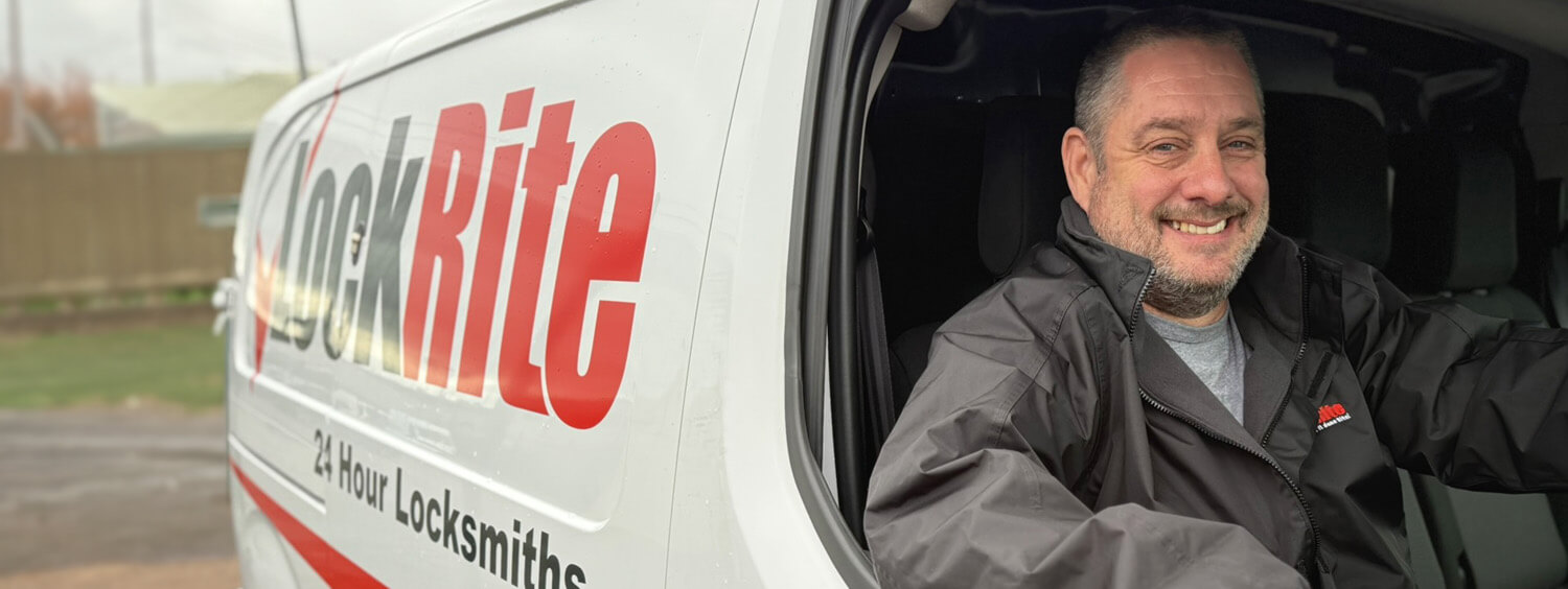 Brentwood locksmith stood beside LockRite branded van