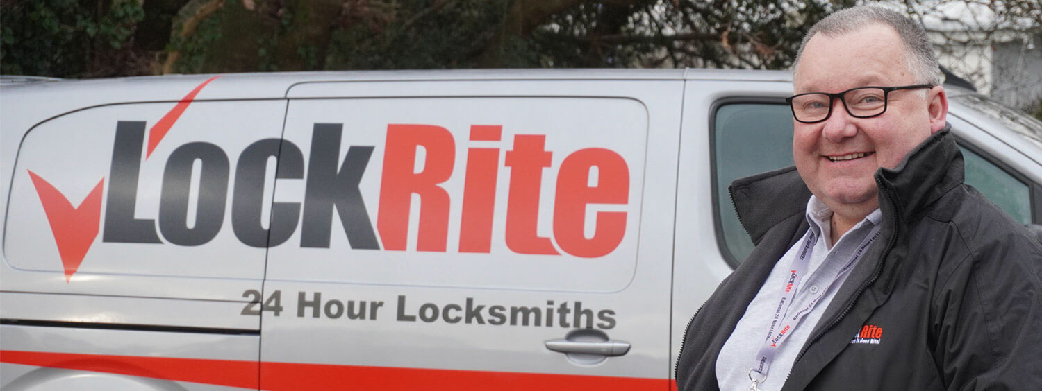 Manchester (M90) locksmith stood beside LockRite branded van